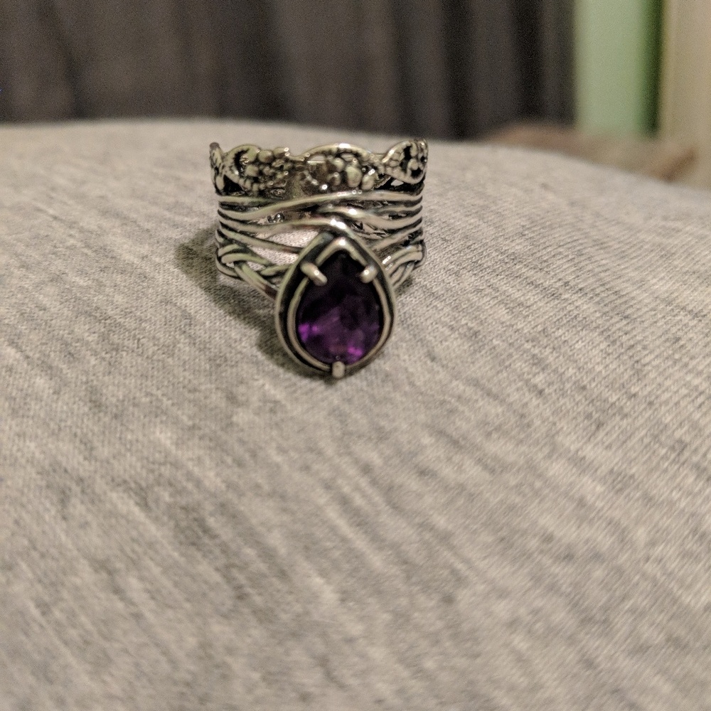Silver ring with purple stone